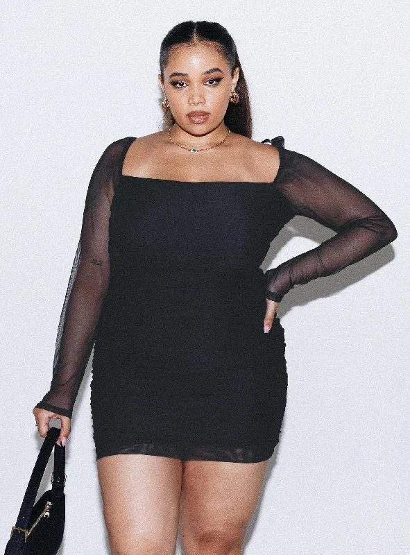 Mini dresses with pom - pom trims for a playful feel Charvi Long Sleeve Mini Dress Black Curve