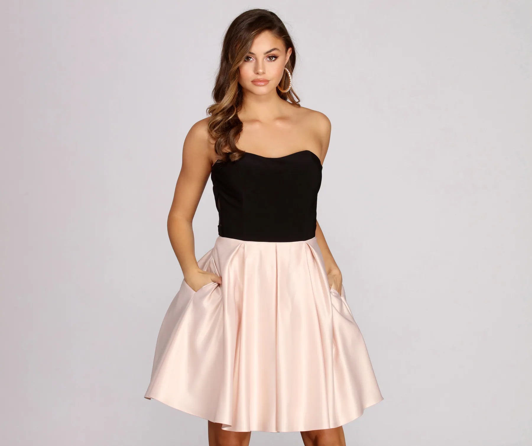 Mini dresses with bow accents for a sweet look Sherry Strapless Formal Dress