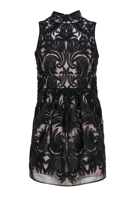 Sheath Women Dress with a Tailored Fit for a Professional Look Sheath Women Dress with a Tailored Fit for a Professional Look Yoana Baraschi - Black Swirled Mesh Mock Neck Cocktail Dress Sz 00