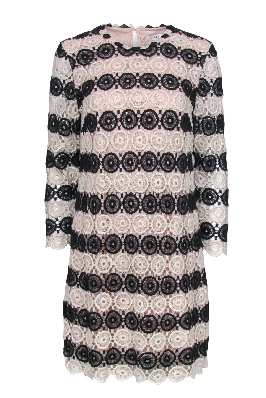 Mini Women Dress with a Short Hem for a Young and Trendy Style Mini Women Dress with a Short Hem for a Young and Trendy Style L.K. Bennett - White & Black Crochet Long Sleeve Shift Dress Sz 8