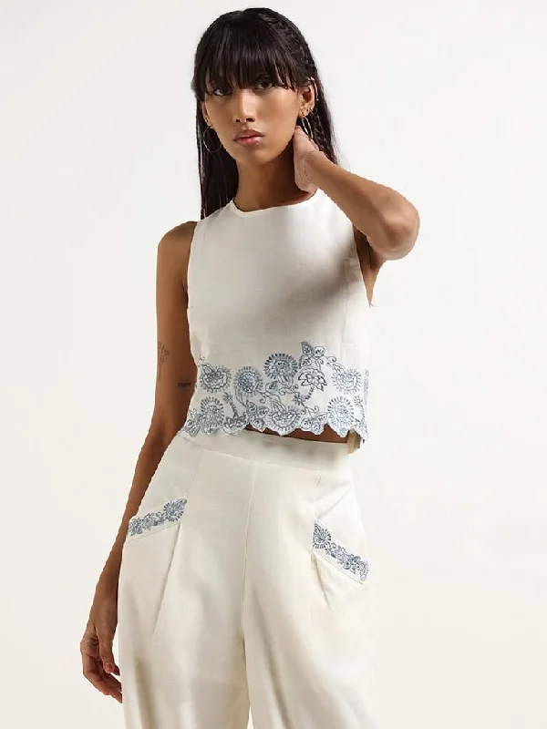 Women's flared office pants Ripped women jeans for a rebellious and fashion - forward style Bombay Paisley White Embroidered Cotton Blend Top Women's flared office pants Ripped women jeans for a rebellious and fashion - forward style Bombay Paisley White Embroidered Cotton Blend Top