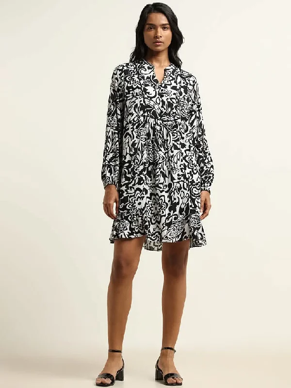 Women's designer brand pants High - rise flare women jeans for a 70s - inspired look LOV Black and White Printed Cotton A-Line Dress