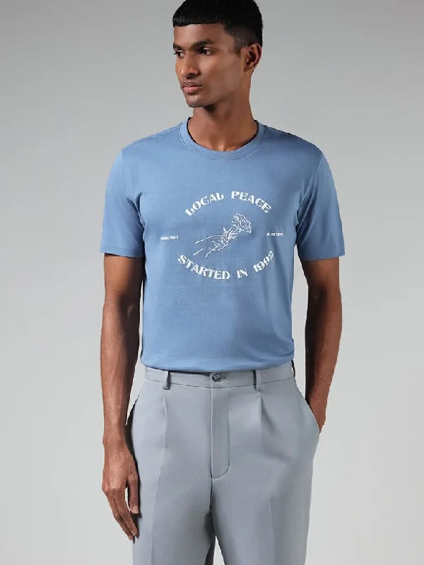 Women's drawstring athletic pants High - rise flare women jeans for a 70s - inspired look Nuon Blue Typographic Printed Cotton Slim Fit T-Shirt