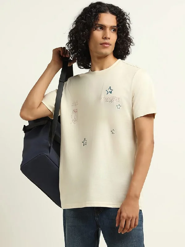 Women's pants with reflective strips Acid - wash women jeans with a retro finish Nuon Cream Printed Cotton Relaxed Fit T-Shirt
