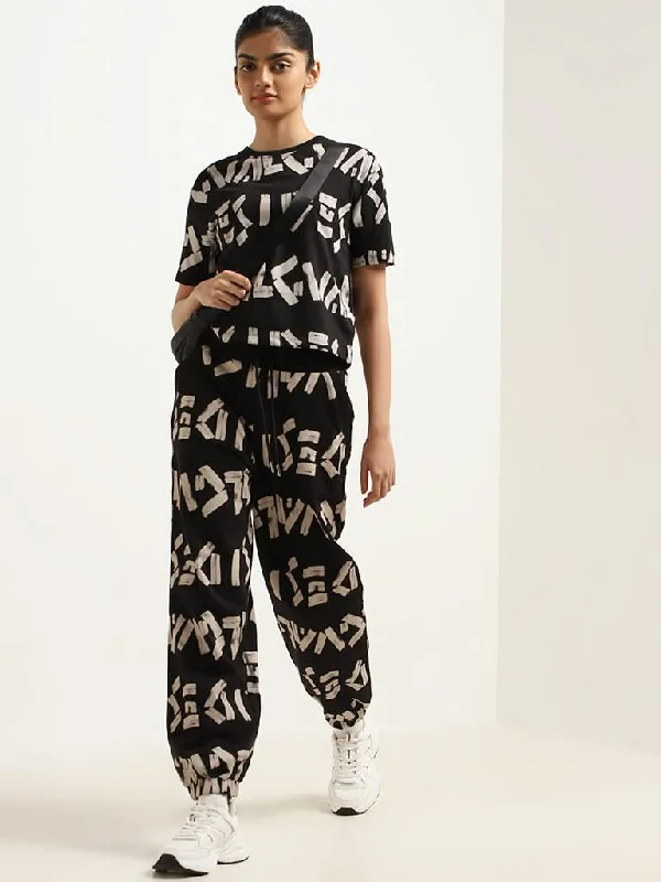 Women's one - piece jumpsuit pants Embroidered women jeans with intricate patterns Studiofit Pink Printed Cotton Joggers