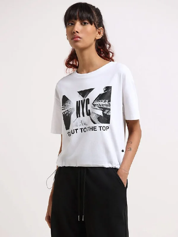 Women's junior - sized denim pants Distressed women jeans for a trendy and edgy look Studiofit White Crop Cotton Blend T-Shirt with Drawstring