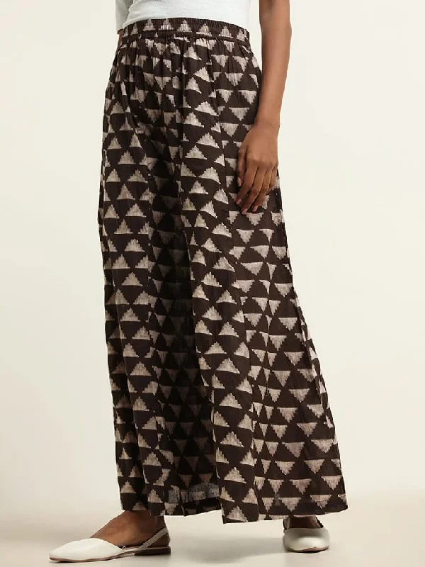 Women's elastic - waist lounge pants Acid - wash women jeans with a retro finish Utsa Brown Printed Palazzos
