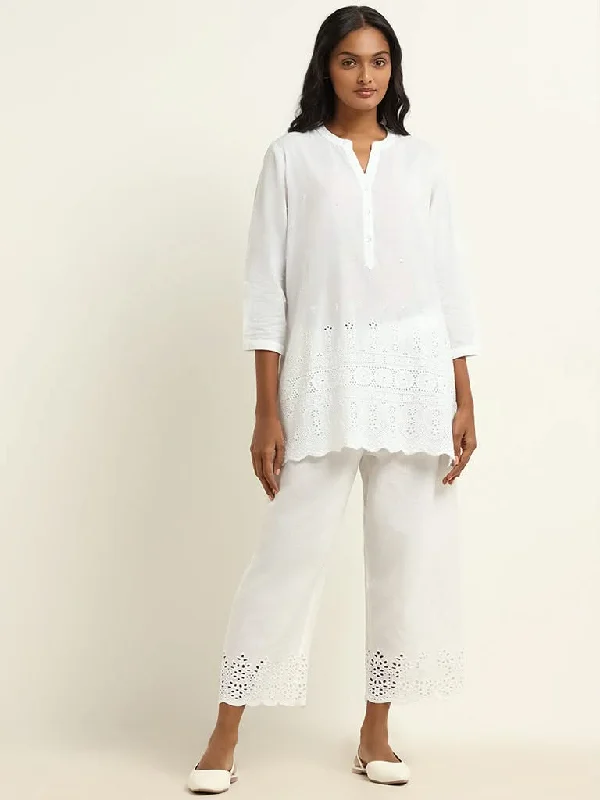 Women's belt - looped work pants Stretch women jeans for enhanced mobility and comfort Utsa White Embroidered Kurti