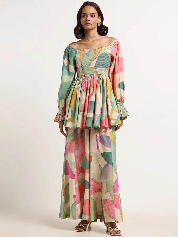 Women's leather moto pants Wide - leg women jeans for a modern and relaxed vibe Vark Multicolored Printed Peplum Top Set