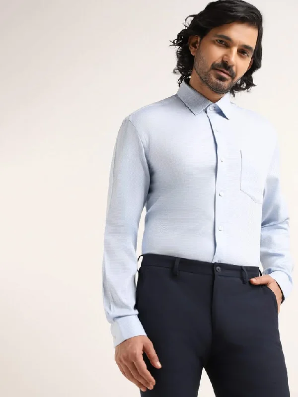 Women's pants with hidden pockets Embellished women jeans with studs or rhinestones for a glamorous touch WES Formals Blue Printed Cotton Relaxed Fit Shirt